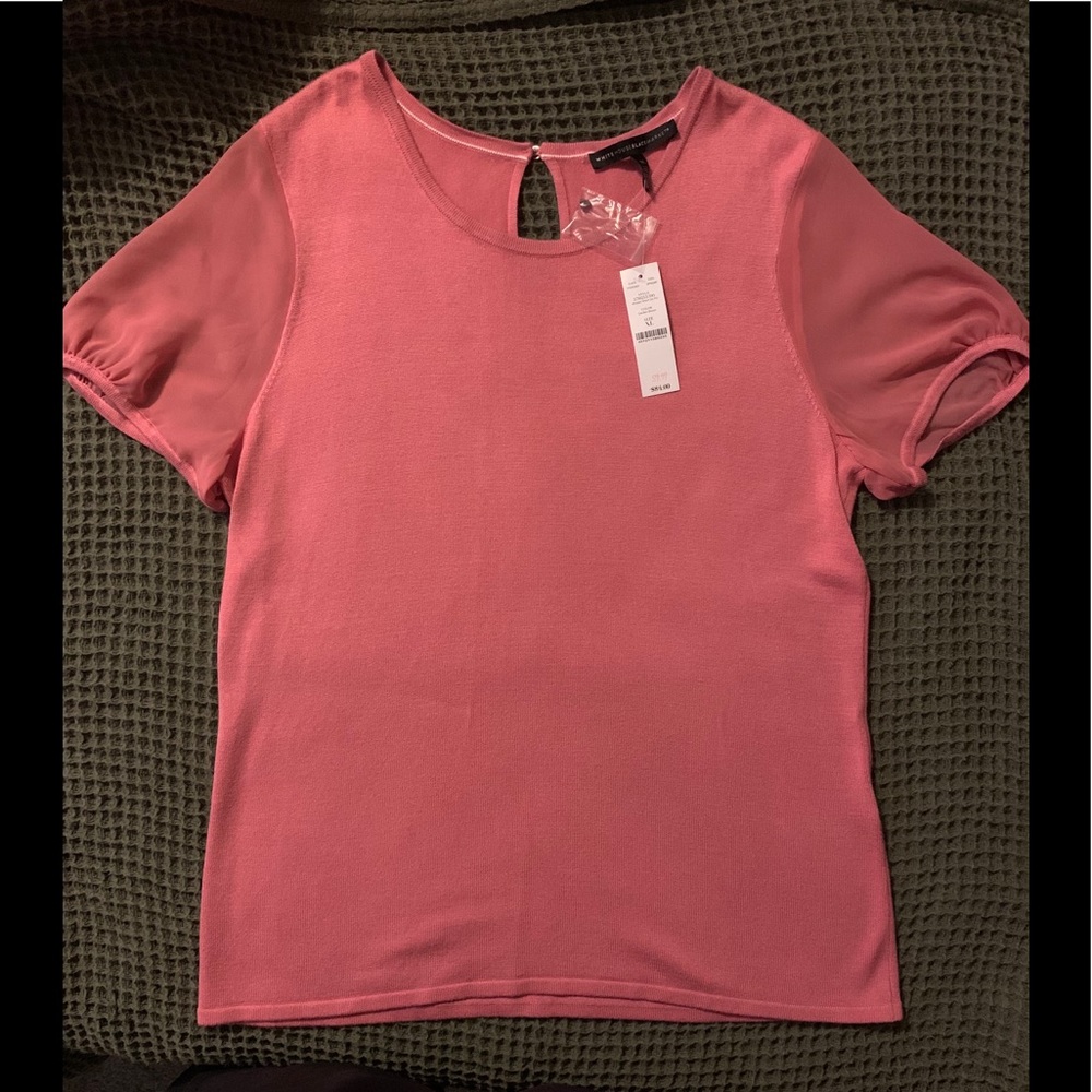 Pink shirt.